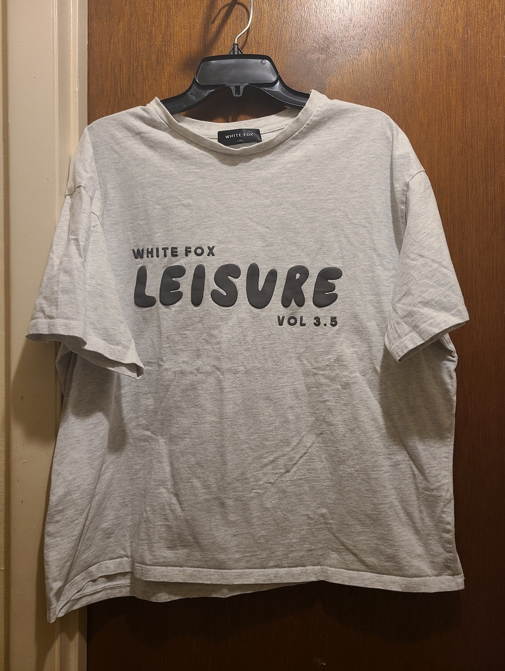 White Fox Womens Top, Size L/XL, Pre-owned, shorter in length for a tshirt.
